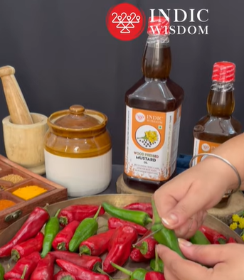 Image of Stuffed Chilli Pickle (भरवां मिर्ची का अचार) Traditional Recipe from Lucknow with Cold Pressed Mustard Oil extracted on wooden churner.