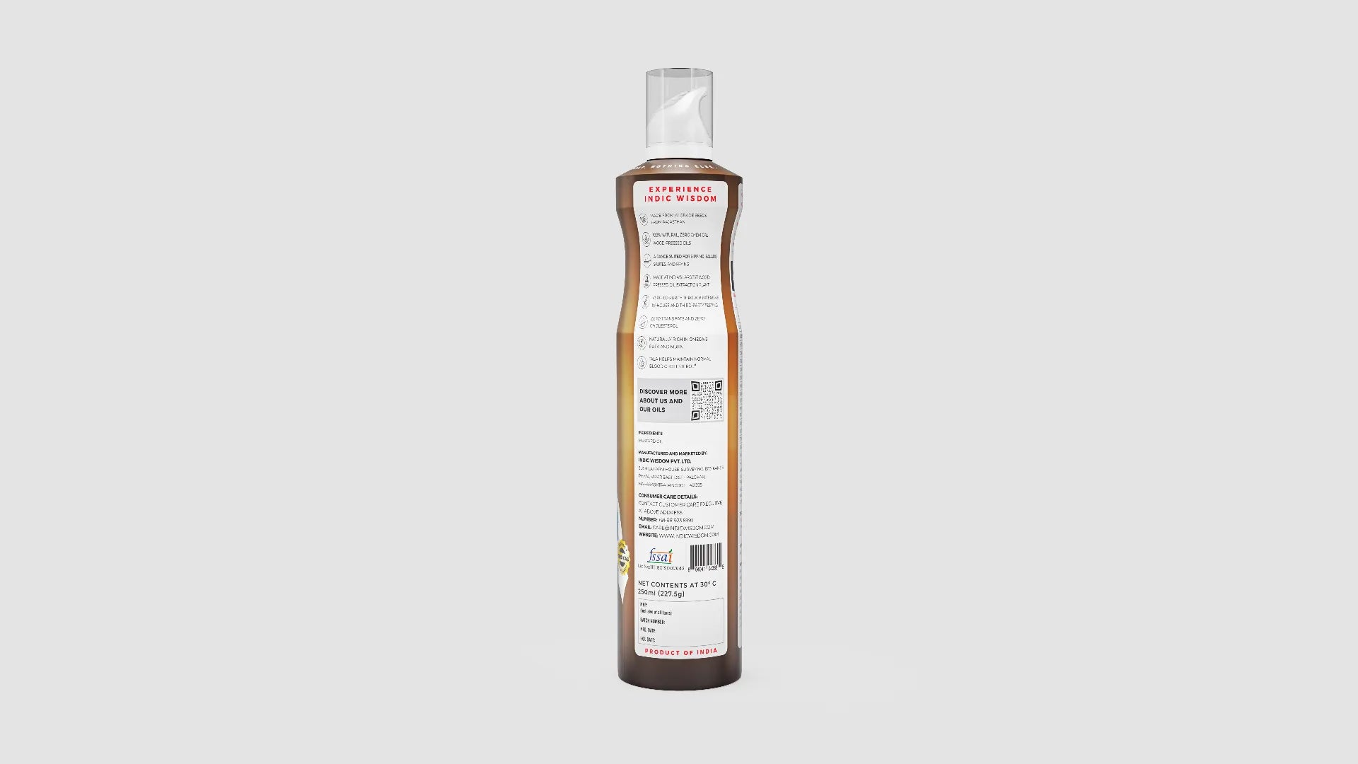 Bottle of oil with label on a white background