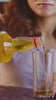 Woman Pouring Oil
